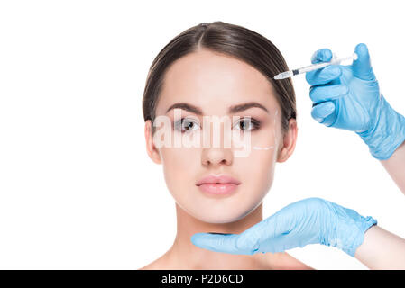 cropped shot of doctor making beauty injection for woman isolated on white Stock Photo