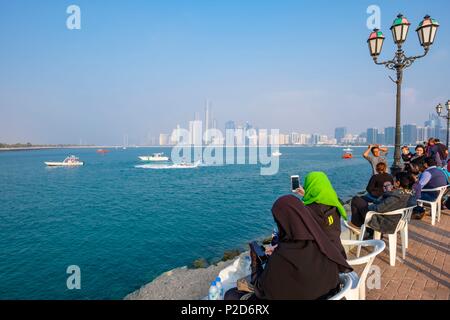 United Arab Emirates, Abu Dhabi, Al Marina district, the Corniche and the skyscrapers of Al Markaziyah district in the background Stock Photo