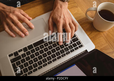 Man using his laptop Stock Photo