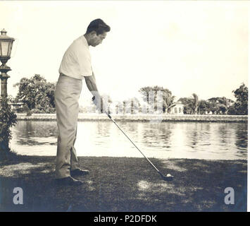 . English: Philippine President Ferdinand E. Marcos playing golf in Malacañan Park . 23 May 2015. Malacañang Palace 43 President Ferdinand Marcos playing golf Stock Photo