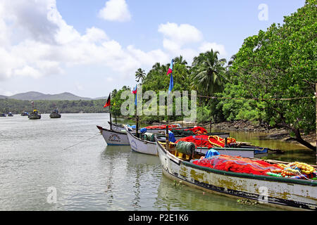 Betul, Goa, India - September 01, 2017: Fishing boats all set for fishing trip to the deep sea near the Cutbon Fishing Jetty in Sal River Betul, Goa Stock Photo