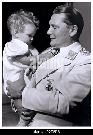 HERMANN GOERING Vintage paternal portrait 1930’s Infant Edda Goering with her uniformed father Hermann Goering head of Nazi Luftwaffe 1938 Berlin  Nazi Germany Stock Photo