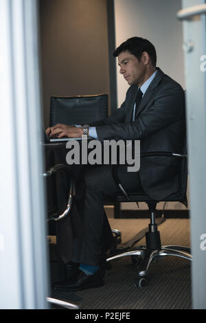 Businessman using laptop Stock Photo