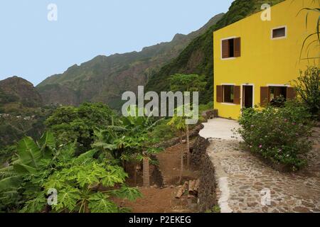 Cape Verde, Santo Antao, Paul valley, Yellow guesthouse perched in the heights Stock Photo