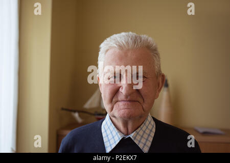 Senior man looking at camera Stock Photo