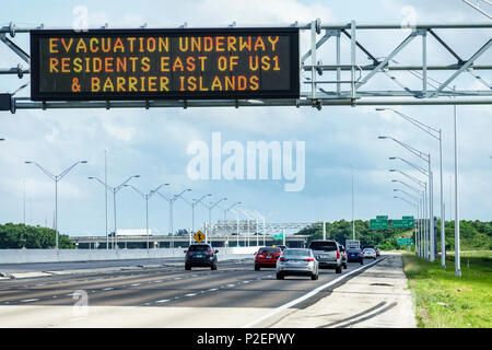 Miami Florida,Hurricane Irma approaching preparation,Interstate I-75 I75,electronic sign,evacuation underway barrier islands East of US1,highway traff Stock Photo