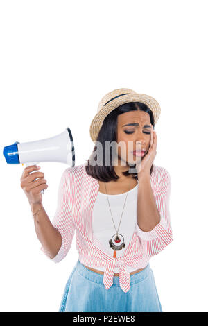 portrait of sad african american woman with loudspeaker isolated on white Stock Photo