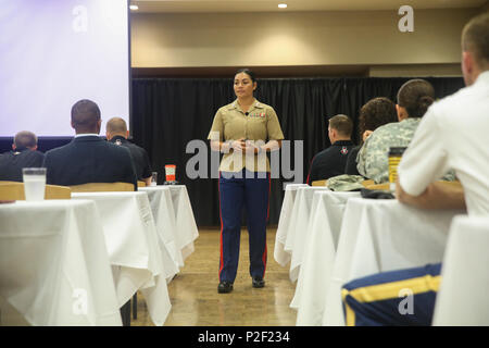 Capt. Evita Mosqueda-Chapman, chief instructor of the Marine Corps Leadership Seminar, leads a lecture at Austin Peay State University in Clarksville, Tenn., Sept. 8, 2016. The seminar, coinciding with Marine Week Nashville, taught attendees Corps’ leadership philosophies as a means to enhance their own leadership skills. Marine Week is a chance for the citizens of the greater Nashville area to meet Marines and learn about Marine Corps’ capabilities. (U.S. Marine Corps photo by Sgt. Lucas Hopkins) Stock Photo