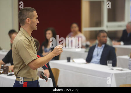 Capt. Jameson Norton, an instructor with the Marine Corps Leadership Seminar, speaks to students at Austin Peay State University in Clarksville, Tenn., Sept. 8, 2016. Coinciding with Marine Week Nashville, MCLS visits colleges across the U.S. to develop attendees’ leadership skills. Marine Week is an opportunity for the people of the greater Nashville area to meet Marines and learn about Corps’ history, traditions and value to the nation. (U.S. Marine Corps photo by Sgt. Lucas Hopkins) Stock Photo