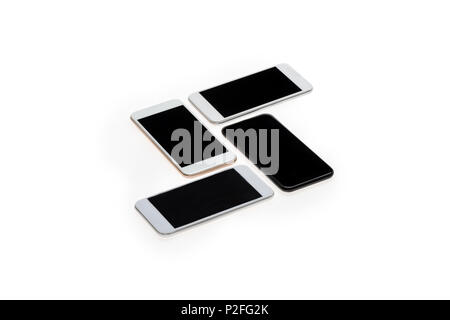 arranged modern smartphones with blank screens isolated on white Stock Photo