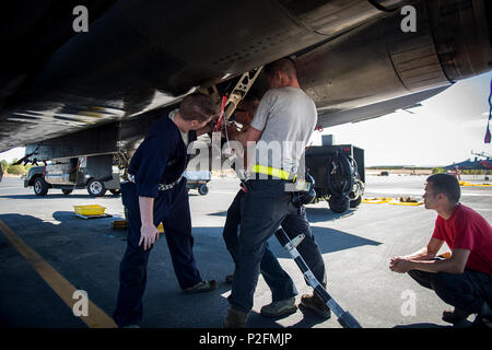 Dedicated crew chiefs from the 48th Aircraft Maintenance Squadron inspect a tail hook on an F-15E Strike Eagle after a sortie in support of Tactical Leadership Programme 16-3 at Los Llanos Air Base, Spain Sep. 16. The training prepares NATO and allied forces’ flight leaders to be mission commanders, lead coalition force air strike packages, instruct allied flying and non-flying personnel in matters related to tactical composite air operations, and provide tactical air expertise to NATO agencies. (U.S. Air Force photo/ Staff Sgt. Emerson Nuñez) Stock Photo