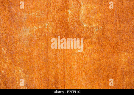 Rusty yellow painted metal wall. Detailed texture Stock Photo