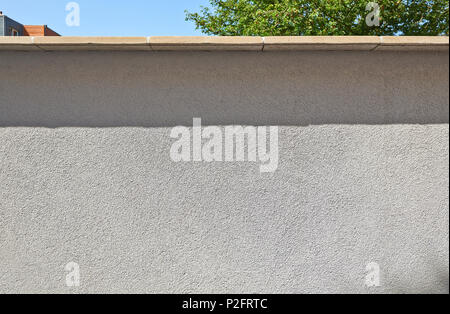 Renovated white ciment wall with hard shadow Stock Photo