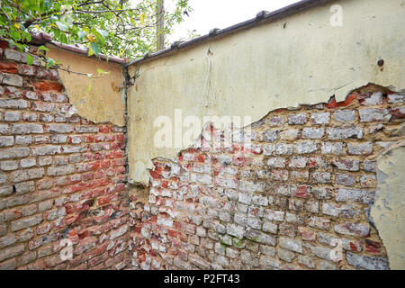 Dirty and grunge red brick wall from exterior Stock Photo