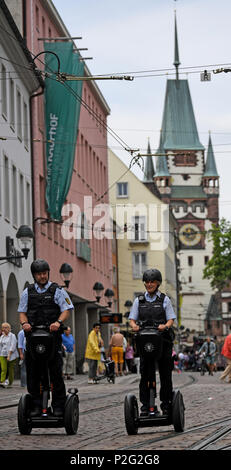 15 June 2018, Germany, Freiburg: Police officers Matthias Engler (L) and Janka Schmidt (R) standing on Segways in downtown Freiburg. The Police in Freiburg will be shortly deploying Segways on a permanent basis. A pilot test started 10 months ago was succesful. Photo: Patrick Seeger/dpa Credit: dpa picture alliance/Alamy Live News Stock Photo