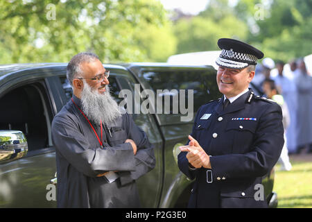 Birmingham, UK. 15th June, 2018. Over 100,000 muslims gather in Small Heath park, Birmingham, to pray on the morning of Eid, the end of the fasting month of Ramadan. West Midlands Police chief Dave Thompson attends. Peter Lopeman/Alamy Live News Stock Photo