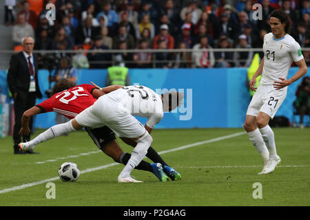 Yekaterinburg, Russia. 15th June, 2018. Uruguay's Martin Caceres (R) battles for the ball with Egypt's Amr Warda during the FIFA World Cup 2018 Group A soccer match between Egypt and Uruguay at the Ekaterinburg Arena in Yekaterinburg, Russia, 15 June 2018. Credit: Ahmed Ramadan/dpa/Alamy Live News Stock Photo