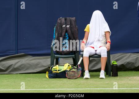 Manchester  UK 15th June 2018   Marie Bouzkova (Czech Republic)) cools down during her quarter-final match against  Evgeniya Rodina (Russia)  at the Fuzion 100 Manchester Trophy held at the Northern Tennis and Squash Club in West Didsbury.  Rodina wins  6-4,  4-6, 6-0. Credit: John Fryer/Alamy Live News Stock Photo