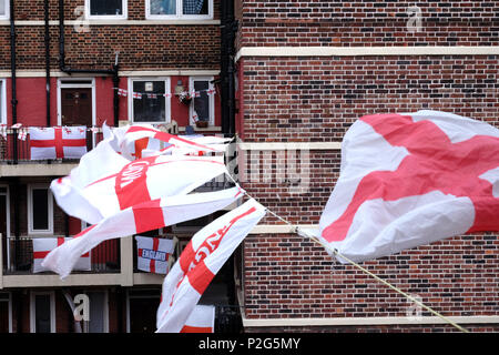 Bermondsey, UK. 15th Jun, 2018. Residents of the Kirby estate in Bermondsey fly their flags for the world cup. Predominantly England flags are interspersed with a Colombian, Polish, Portugese and French flag on this freindly estate in South London Credit: Rachel Megawhat/Alamy Live News Stock Photo