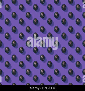 set of painted easter eggs on purple Stock Photo