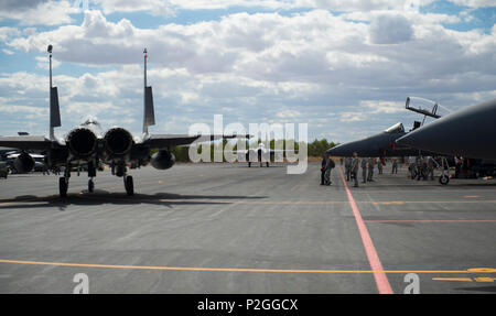 At Los Llanos Air Base, Spain, on September 15, 2016, F-15E Strike Eagles from the 494th Fighter Squadron, Royal Air Force Lakenheath, taxied for takeoff in support of Tactical Leadership Programme 16-3. The F-15E, with twin Pratt & Whitney F100-PW-229 engines, participated in exercises preparing NATO and allied flight leaders to command missions, coordinate coalition air strikes, train personnel in tactical composite air operations, and provide air expertise to NATO agencies, ensuring operational readiness and coalition interoperability. Stock Photo