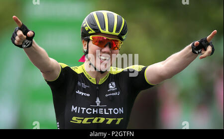 Mitchelton Scott's Sarah Roy celebrates winning as she crosses the finish line during stage three of the OVO Energy Women's Tour from Atherstone to Royal Leamington Spa. Stock Photo