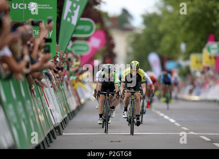 Mitchelton Scott's Sarah Roy celebrates winning as she crosses the finish line during stage three of the OVO Energy Women's Tour from Atherstone to Royal Leamington Spa. Stock Photo