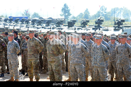 U.S. Army Soldiers from the 2nd Battalion, 135th Infantry Minnesota Army National Guard and the 173rd Airborne Brigade stand in formation during the Immediate Response 16 closing ceremony, Sept. 22, 2016, held at the Eugen Kvaternik training area in Slunj, Croatia. Immediate Response 16 is a multinational, brigade-level command post exercise utilizing computer-assisted simulations and field training exercises spanning two countries, Croatia and Slovenia. The exercises and simulations are built upon a decisive action based scenario and are designed to enhance regional stability, strengthen Alli Stock Photo