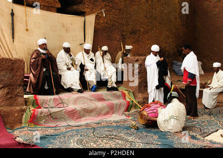 LALIBELA, ETHIOPIA - 30 AUGUST 2013: Holy Mass of the orthodox Ethiopian church of religious churches in carve in solid rock in Lalibela Stock Photo