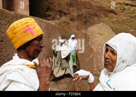 LALIBELA, ETHIOPIA - 30 AUGUST 2013: Ethiopian pilgrims of religious churches in carve in solid rock in Lalibela Stock Photo