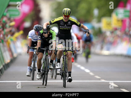 Mitchelton Scott's Sarah Roy celebrates winning as she crosses the finish line during stage three of the OVO Energy Women's Tour from Atherstone to Royal Leamington Spa. Stock Photo