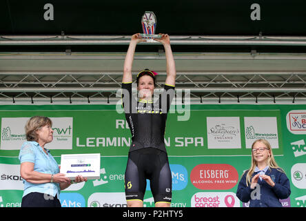 Mitchelton Scott's Sarah Roy celebrates on the podium after winning stage three of the OVO Energy Women's Tour from Atherstone to Royal Leamington Spa. Stock Photo