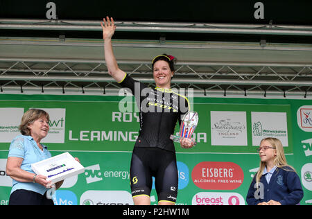 Mitchelton Scott's Sarah Roy celebrates on the podium after winning stage three of the OVO Energy Women's Tour from Atherstone to Royal Leamington Spa. Stock Photo