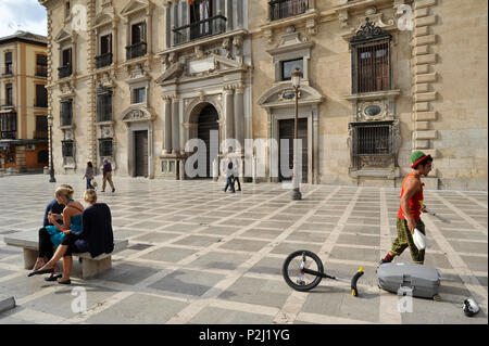 Tourists and juggler on the Plaza Nueva, Granada, Andalusia, Spain Stock Photo