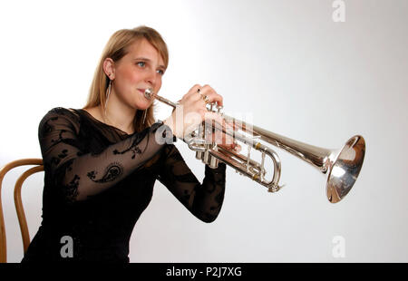 Trumpet, silver plated brass, being held in playing position Stock Photo