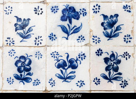 Ornamental old typical tiles from Portugal called azulejos made with colored ceramic tiles Stock Photo
