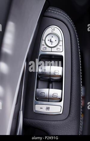 The buttons that we can find in the door of a modern car. Stock Photo