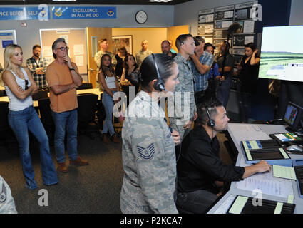 Kate Hudson and Kurt Russel, Deepwater Horizon actors, receive a tour of the 334th Training Squadron air traffic control tower simulator at Cody Hall before the Deepwater Horizon movie screening Sept. 20, 2016, on Keesler Air Force Base, Miss. Before the screening, Russell, Hudson and movie director, Peter Berg, took a short tour of the 81st Training Wing and 403rd Wing to meet with Airmen and learn about their missions at Keesler. (U.S. Air Force photo by Kemberly Groue/Released) Stock Photo