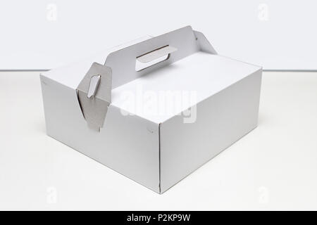 Big White Cardboard Box For Cake Delivery Stock Photo