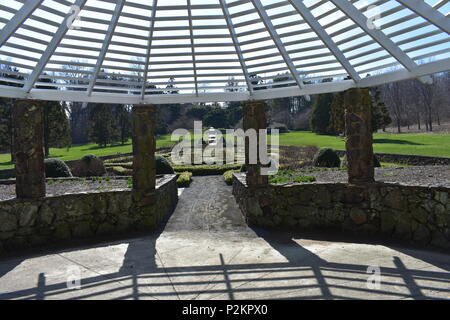 View of the garden from inside the gazebo at Deep Cut Gardens at Middletown, NJ, in the early Spring Stock Photo