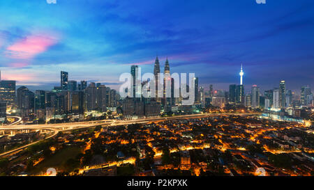 Kuala lumpur cityscape. Panoramic view of Kuala Lumpur city skyline during sunrise viewing skyscrapers building and in Malaysia. Stock Photo