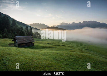Sunrise at lake Geroldsee, Wagenbruechsee, Kruen, near Garmisch-Partenkirchen, Upper Bavaria, Bavaria, Germany Stock Photo