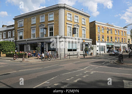 The Victoria Inn on Peckham's Bellenden Road, London. Shown on a summer evening with customers sitting outside enjoying the sunshine. Stock Photo