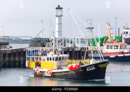 Fishing boat entering harbour, Kirkwall, Mainland, Orkney Islands, Northern Isles, Scotland, United Kingdom Stock Photo