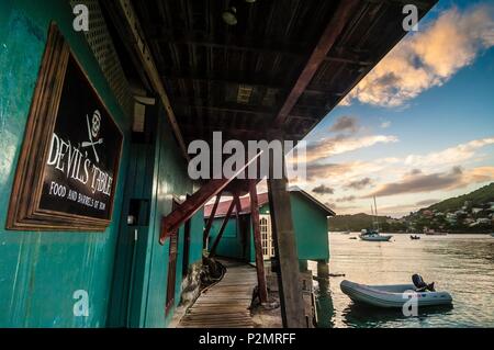 Caribbean, Lesser Antilles, St. Vincent and the Grenadines, Bequia Island, Port Elizabeth, Devil's Table Restaurant in Admiralty Bay Stock Photo