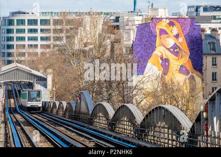 France, Paris, 13th district, Street Art, the underground train line 6 in front of the artist's work La Madre Secular ©Inti