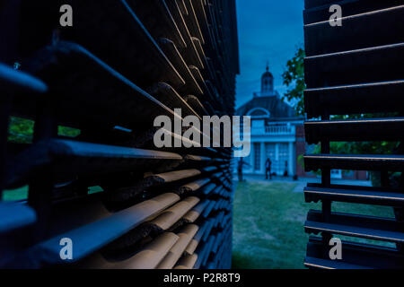 London, UK. 15th Jun, 2018. The Pavilion at night - Serpentine Pavilion 2018, designed by the Mexican architect Frida Escobedo. The courtyard-based design draws on both the domestic architecture of Mexico and British materials. It is alligned the Prime Meridian line at London’s Royal Observatory in Greenwich. Credit: Guy Bell/Alamy Live News Stock Photo