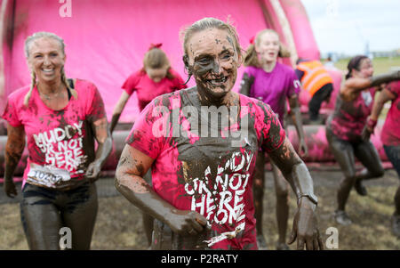 Poole, UK. 16th June 2018.   Mud, mud, glorious mud. Over a thousand women took part in the Pretty Muddy 5k race in Poole raising money for Cancer Research UK. Poole Dorset, UK. Credit: Richard Crease/Alamy Live News Stock Photo