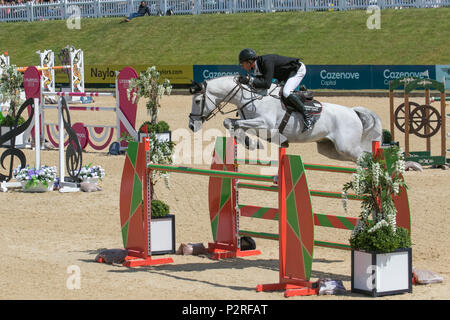 Bolesworth, Cheshire, UK. 16th Jun, 2018. Show Jumper Juda Burgess riding Comeback de Fremis (Competition S14-CS12 Grand Prix) at the Equerry Bolesworth International Horse Show. Credit MediaWorldImages/AlamyLiveNews. Stock Photo