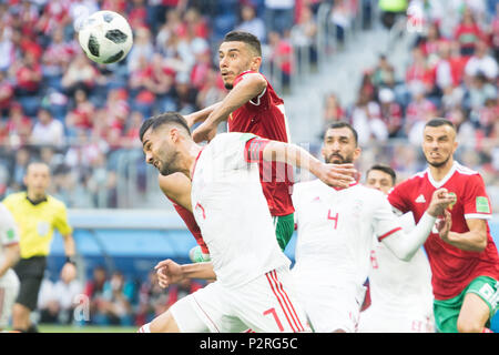 Fltr. Masoud SHOJAEI (IRN) Younes BELHANDA (MAR), Roozbeh CHESHMI (IRN), Romain SAISS (MAR) in the fight for the ball, Action, Morocco (MAR) - Iran (IRN) 0: 1, Preliminary Round, Group B, Game 4, on 15.06.2018 in St.Petersburg; Football World Cup 2018 in Russia from 14.06. - 15.07.2018. | usage worldwide Stock Photo